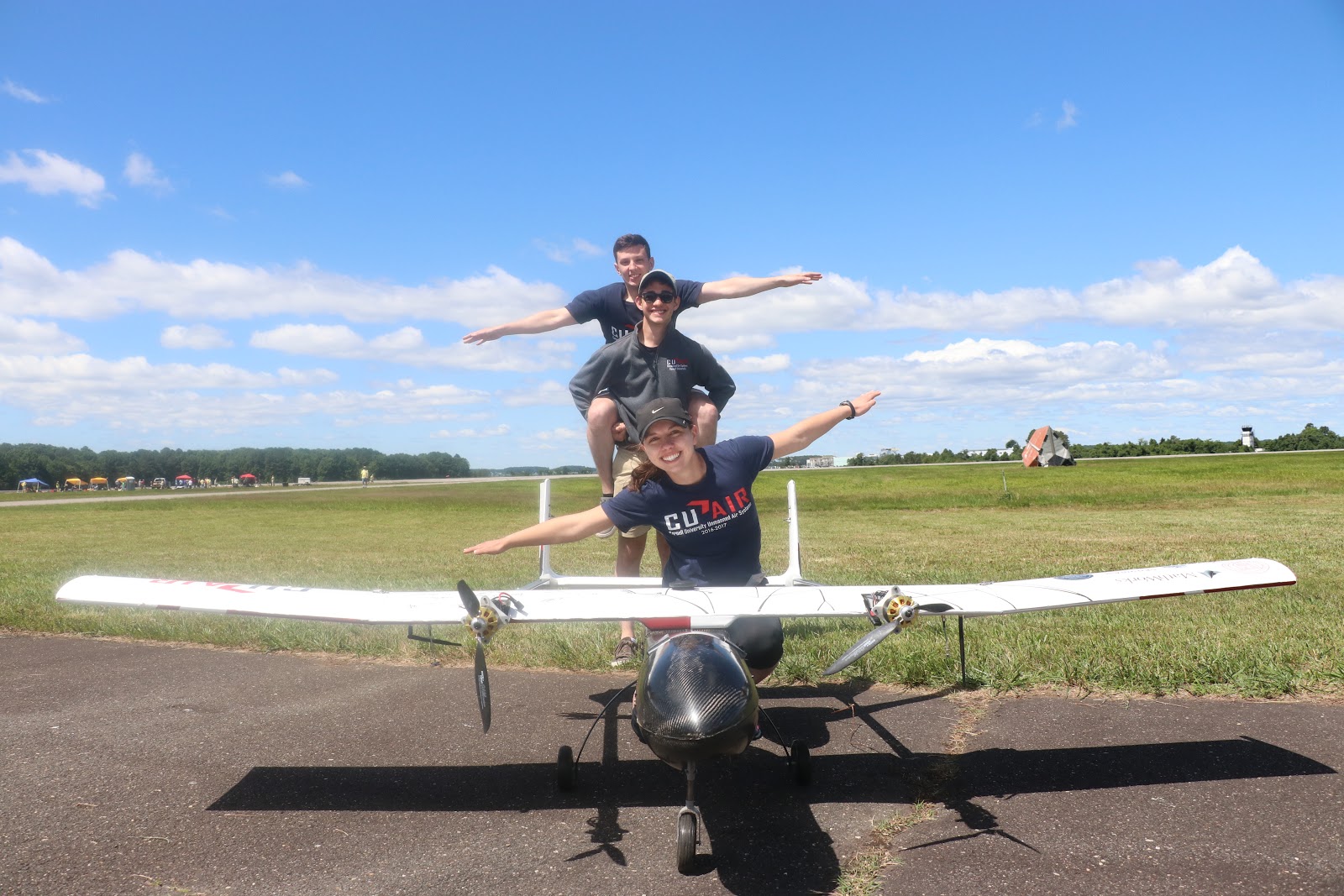 CUAir_Members of the CUAir team with their autonomous unmanned aircraft