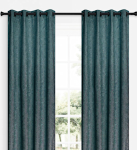A dark green curtain panels covering a window.