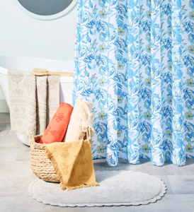 white shower curtain with blue floral print