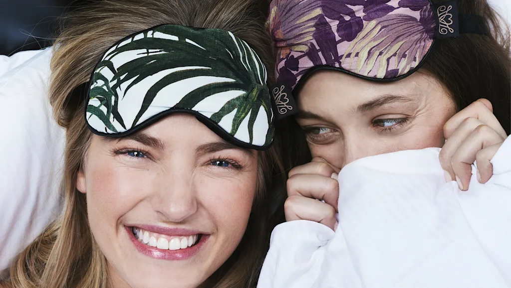 Two women with sleeping masks