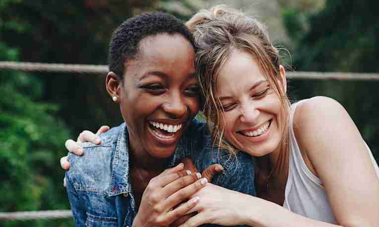two girls holding hands