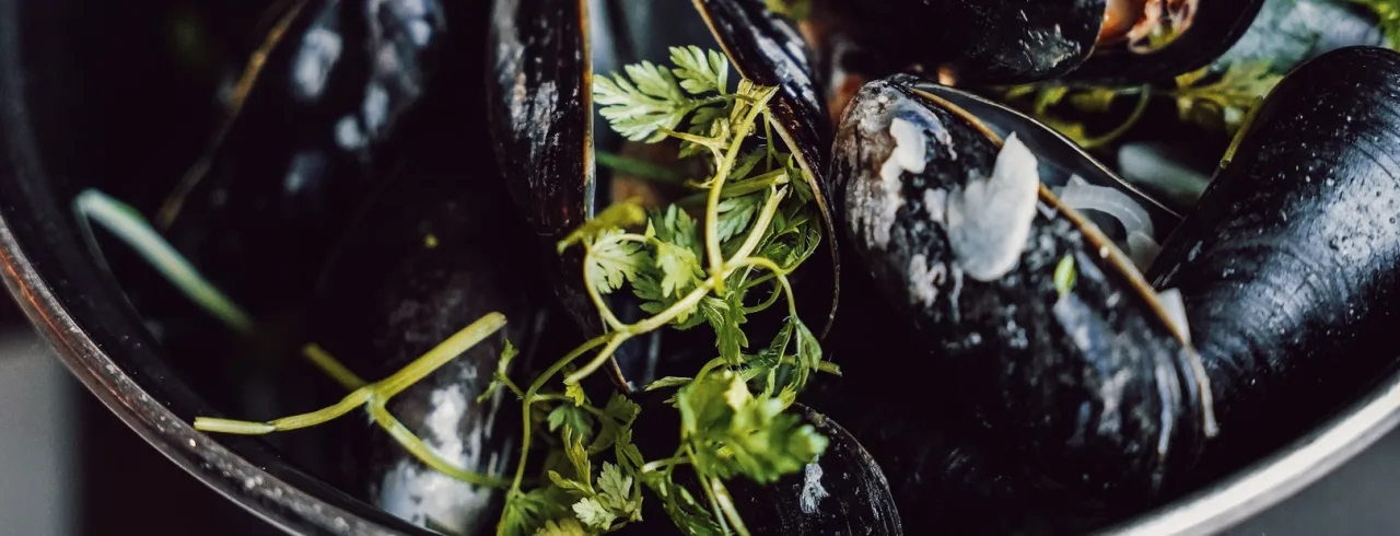 A bowl with mussels served at The Social Bar & Bistro. 