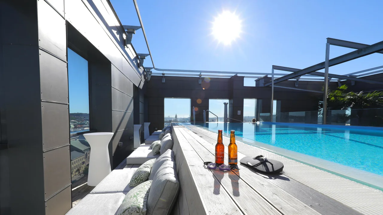 Beer at the rooftop pool at Clarion Hotel® Post in Gothenburg.