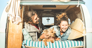 Couple in a Van with a Yorkie