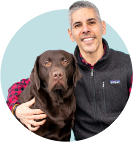 President Brian Macias with his Chocolate Lab, Jojo