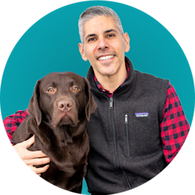 President Brian Macias with his Chocolate Lab, Jojo