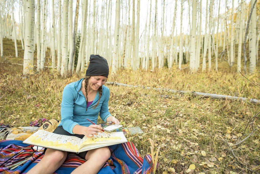 sarah painting in aspen forest
