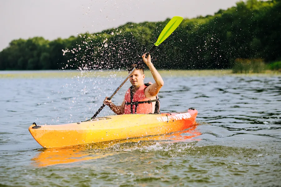 man kayaking | man kayaking