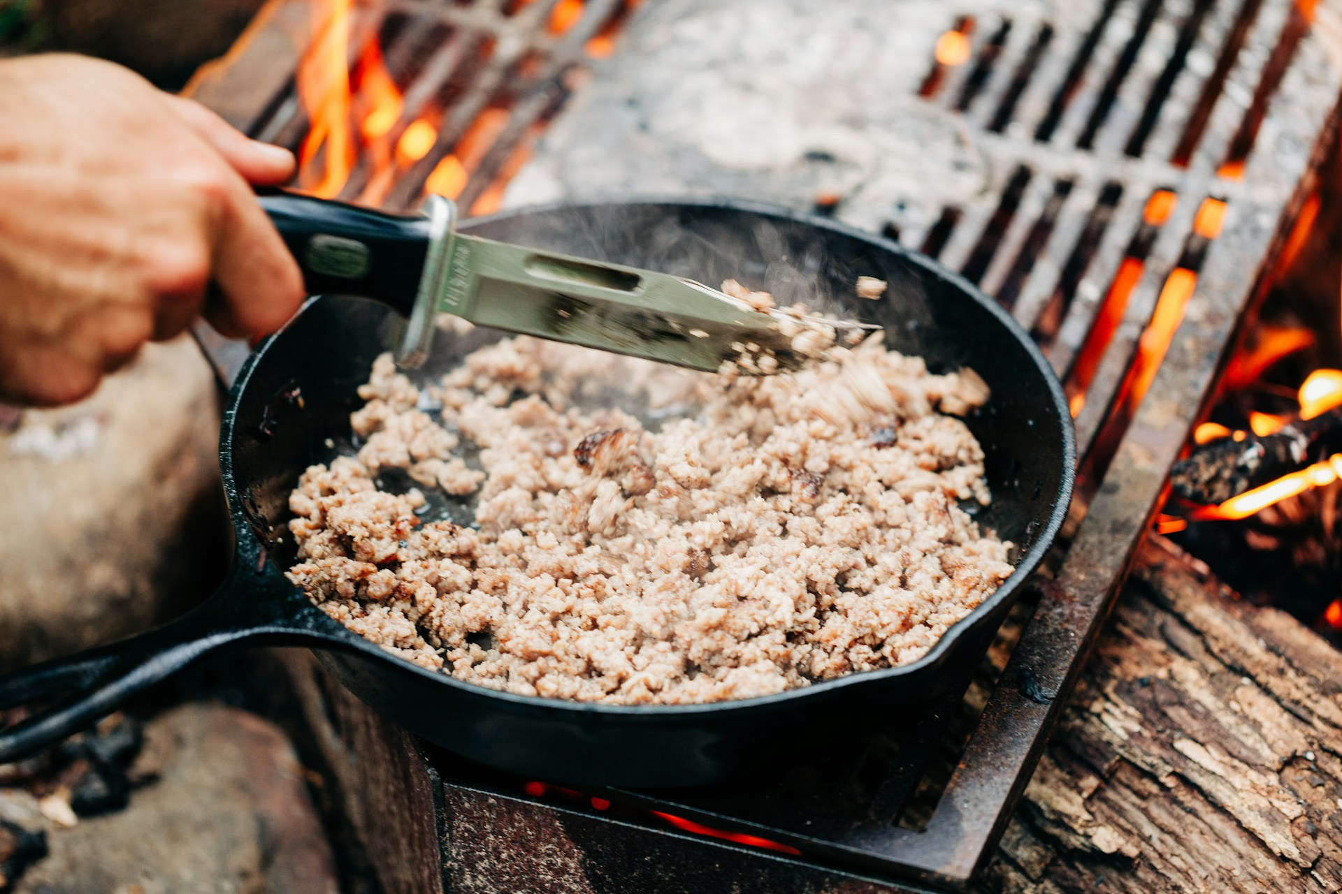 backpacker preparing a meal