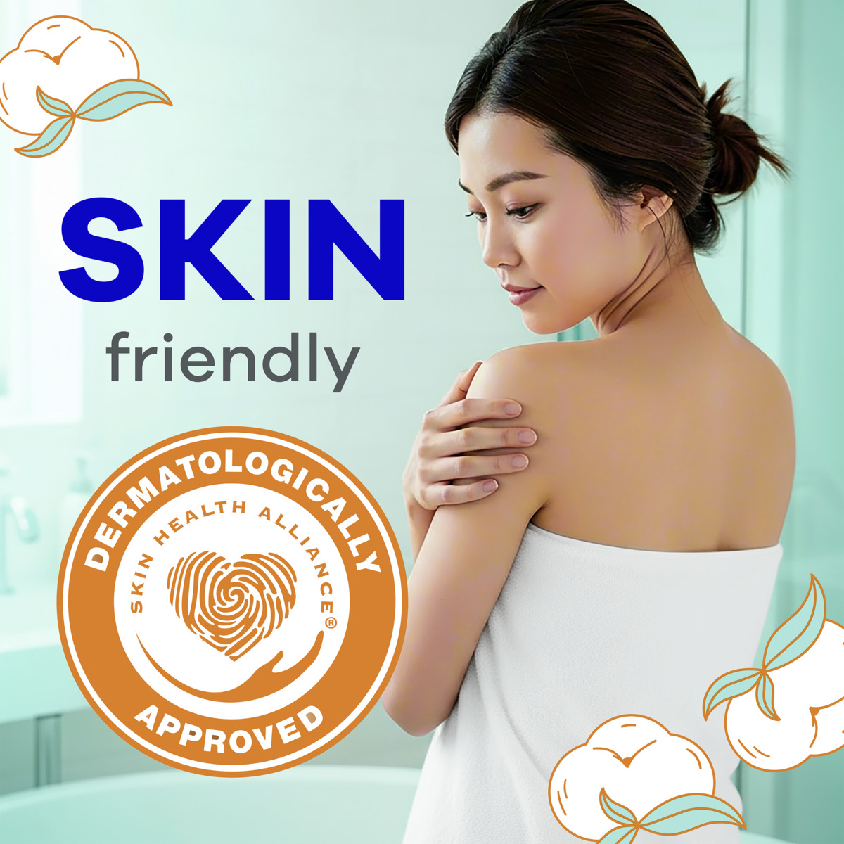 Photograph of a woman wrapped in a white towel with text and a seal indicating a skin-friendly product. The design includes an orange circular "Dermatologically Approved" seal from Skin Health Alliance.