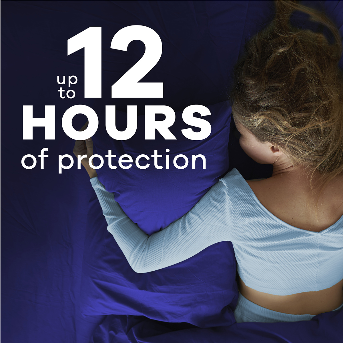 Always Infinity FlexFoam Pads provide up to 12 hours of protection. Features woman sleeping.