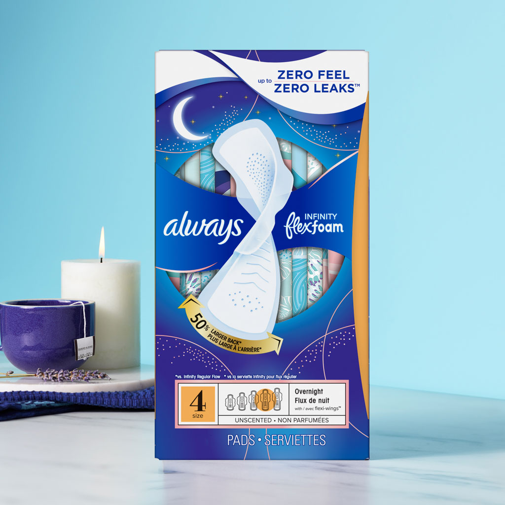 Always Infinity FlexFoam pads: pack of 22, designed for comfort and zero leaks, against a serene blue background