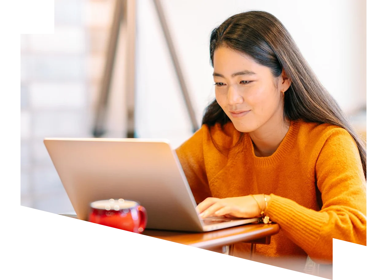 Young female studying on a laptop