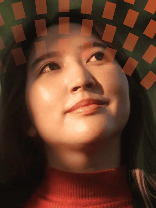 Asian woman looking up