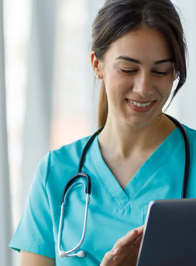 Female clinician using tablet