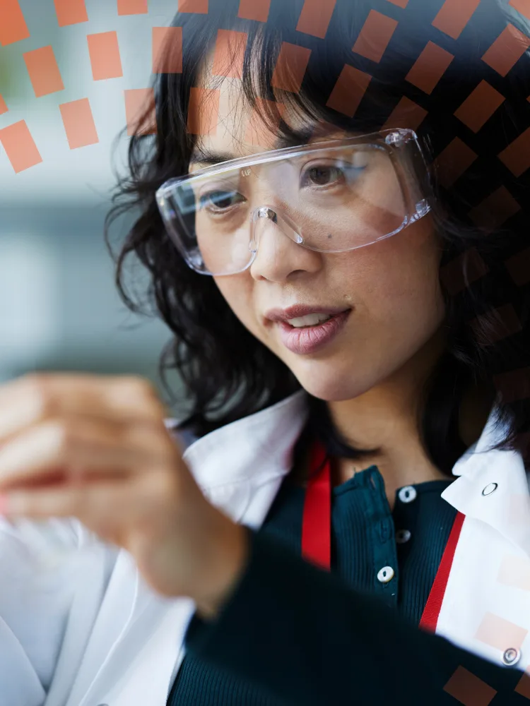 Asian Female researcher pipetting in the lab