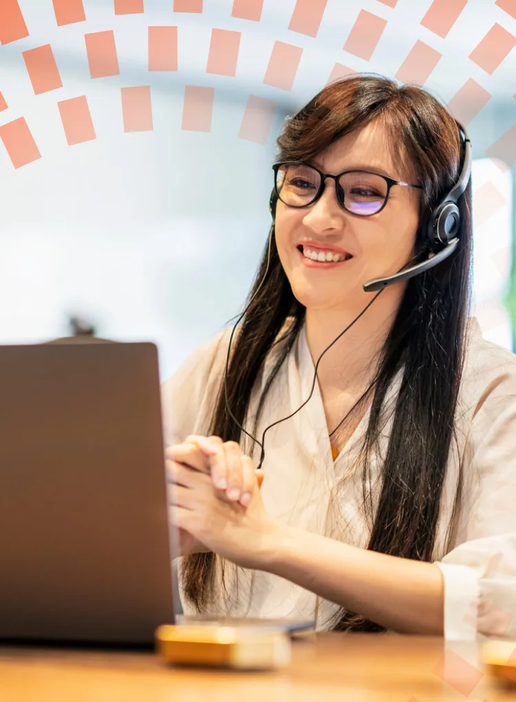 Customer service agent sitting in front of a computer screen