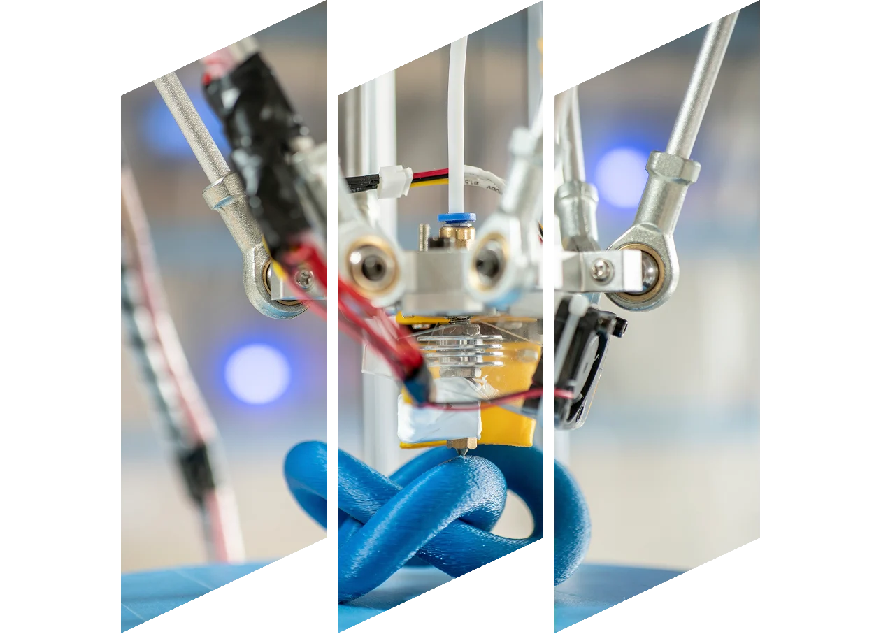 Close up of 3D printing. device is printing an abstract blue knot