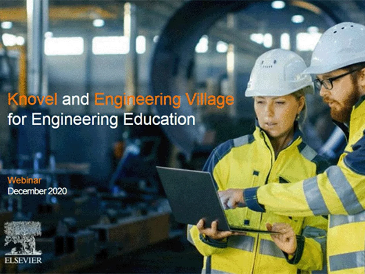 Two heavy industry engineers looking at laptop