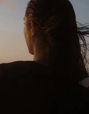 Woman looking off into distance