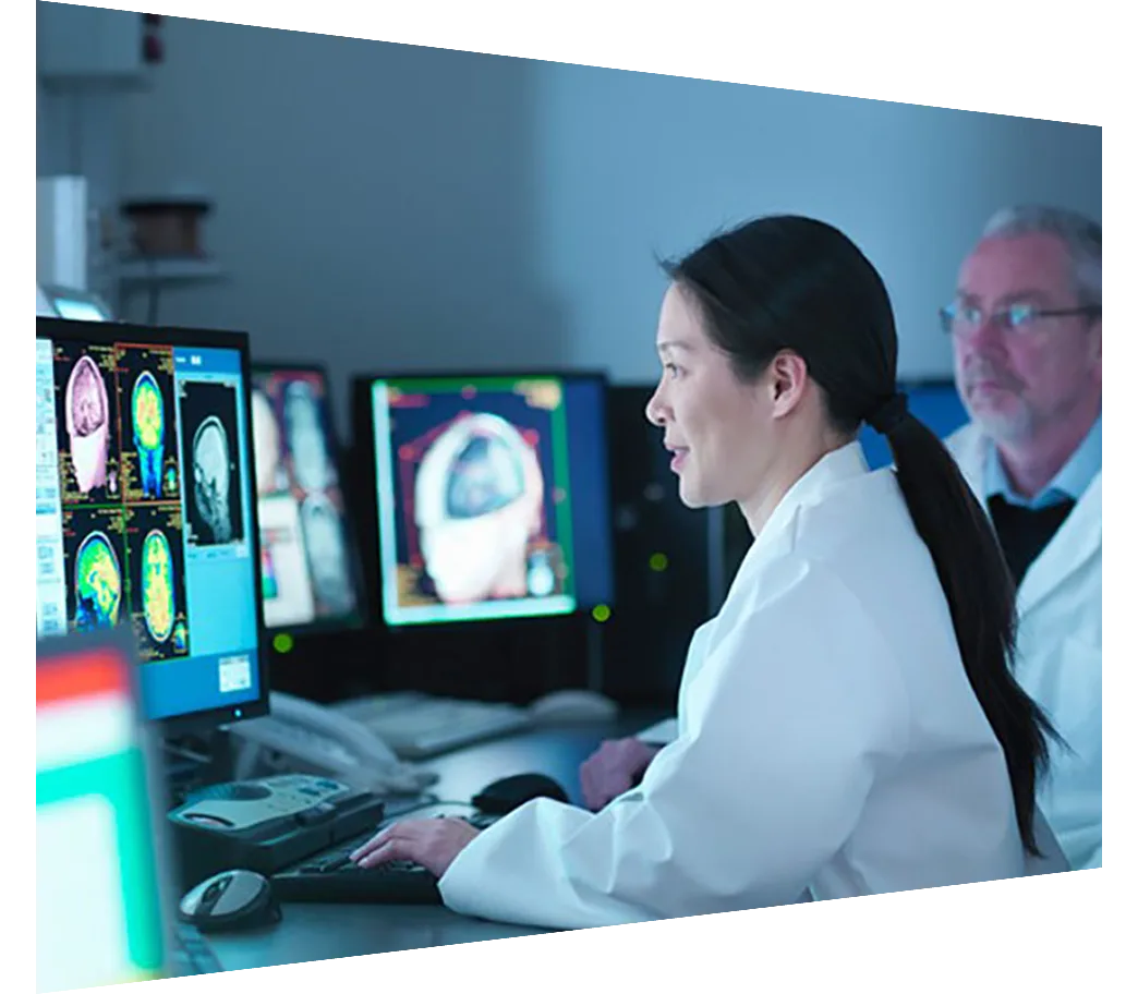 Clinicians reviewing digital medical imagery