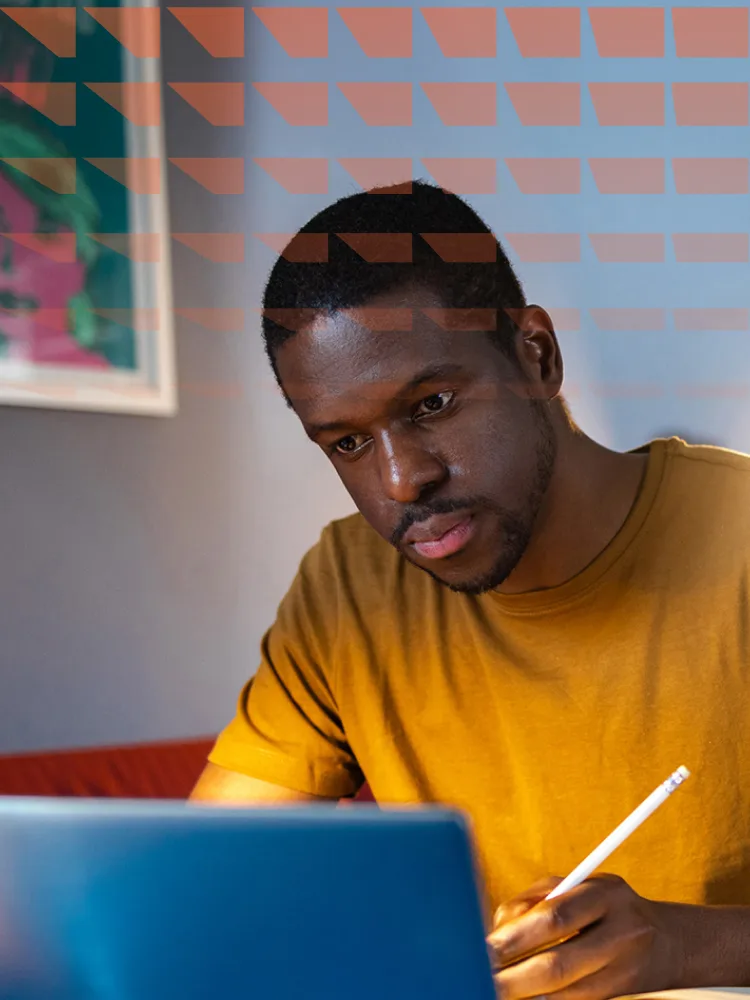 African American student studying late at home