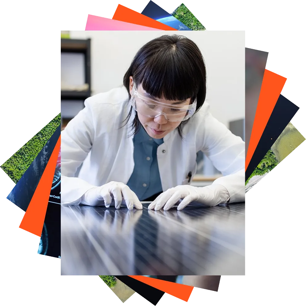 A female engineer looking at an electric power panel.
