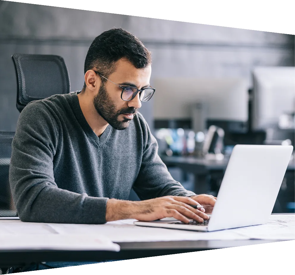 Man and woman looking at computer