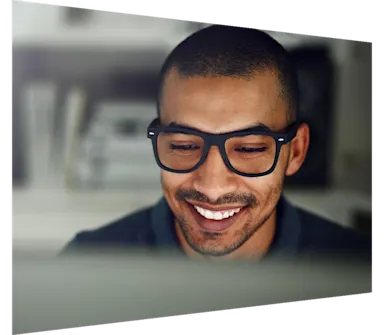Cropped shot of a businessman using his computer in his home office