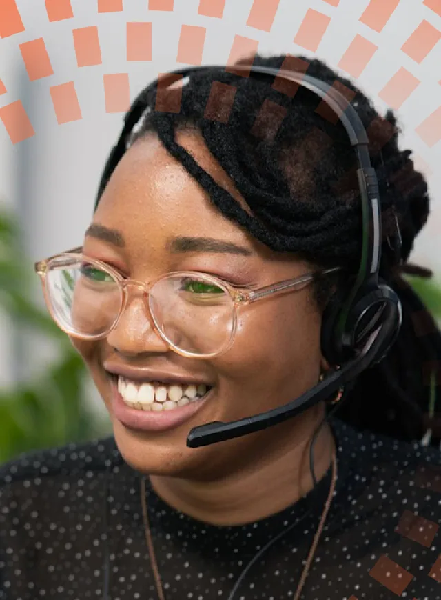 Customer service agent sitting in front of a computer screen