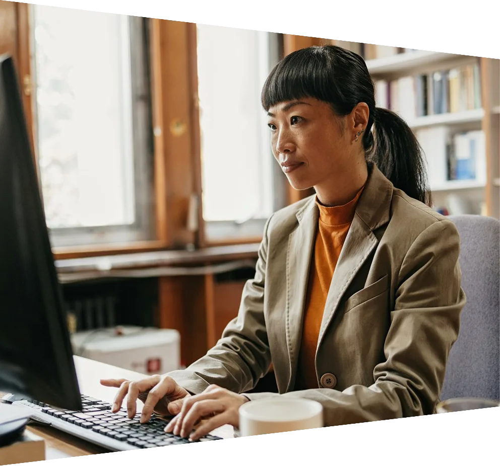 Author writing at desk