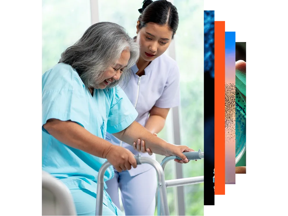 Caregiver assisting senior woman in wheelchair