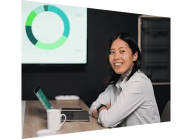 Young businesswoman attending business meeting in meeting room in modern office working space