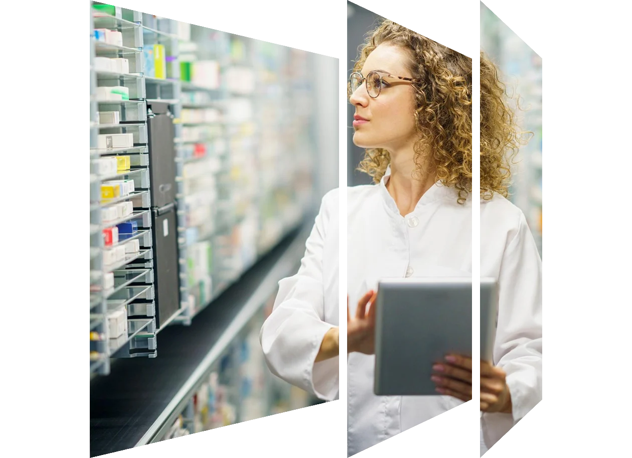 Pharmacist wearing eyeglasses taking an inventory of stock