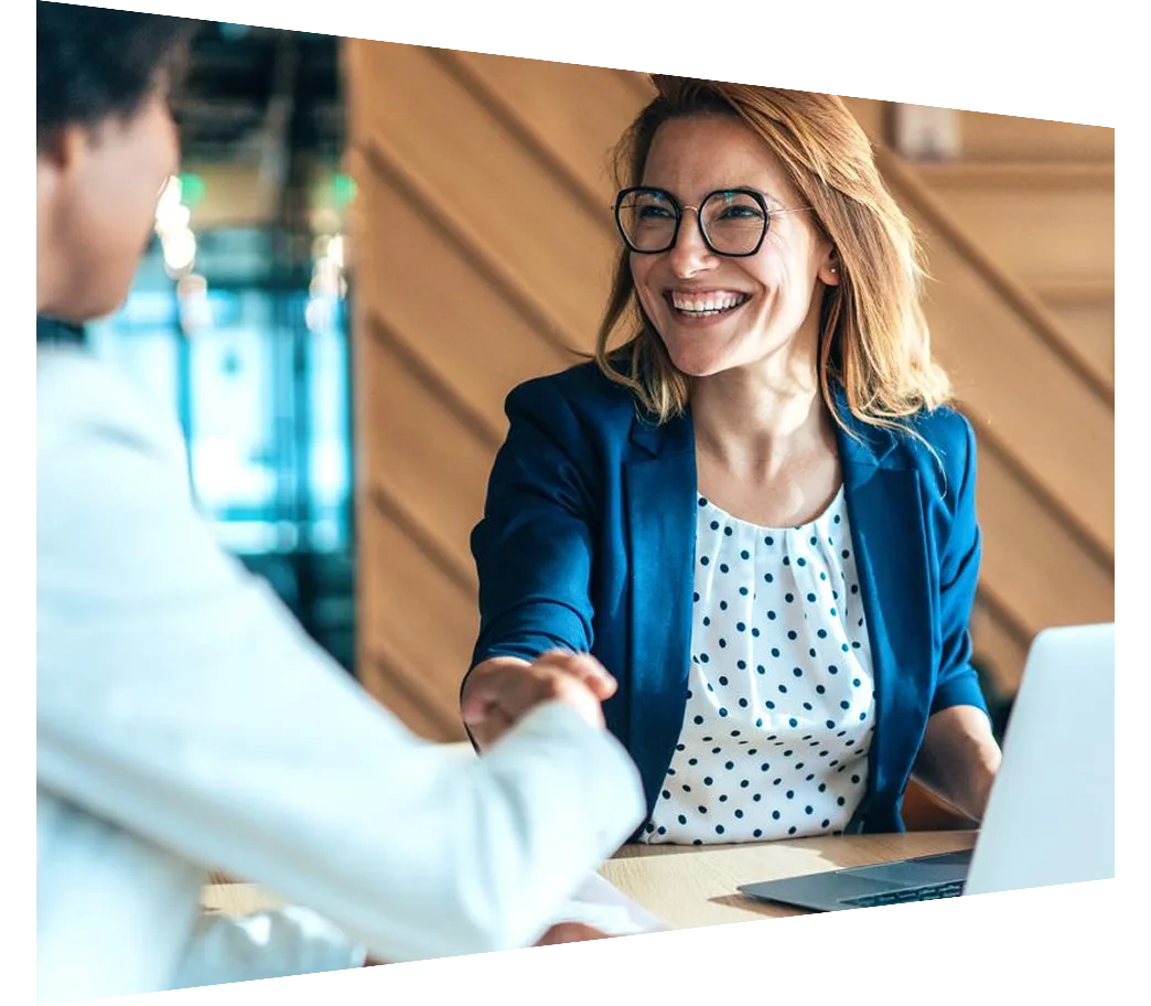 Two businesswomen shaking hands