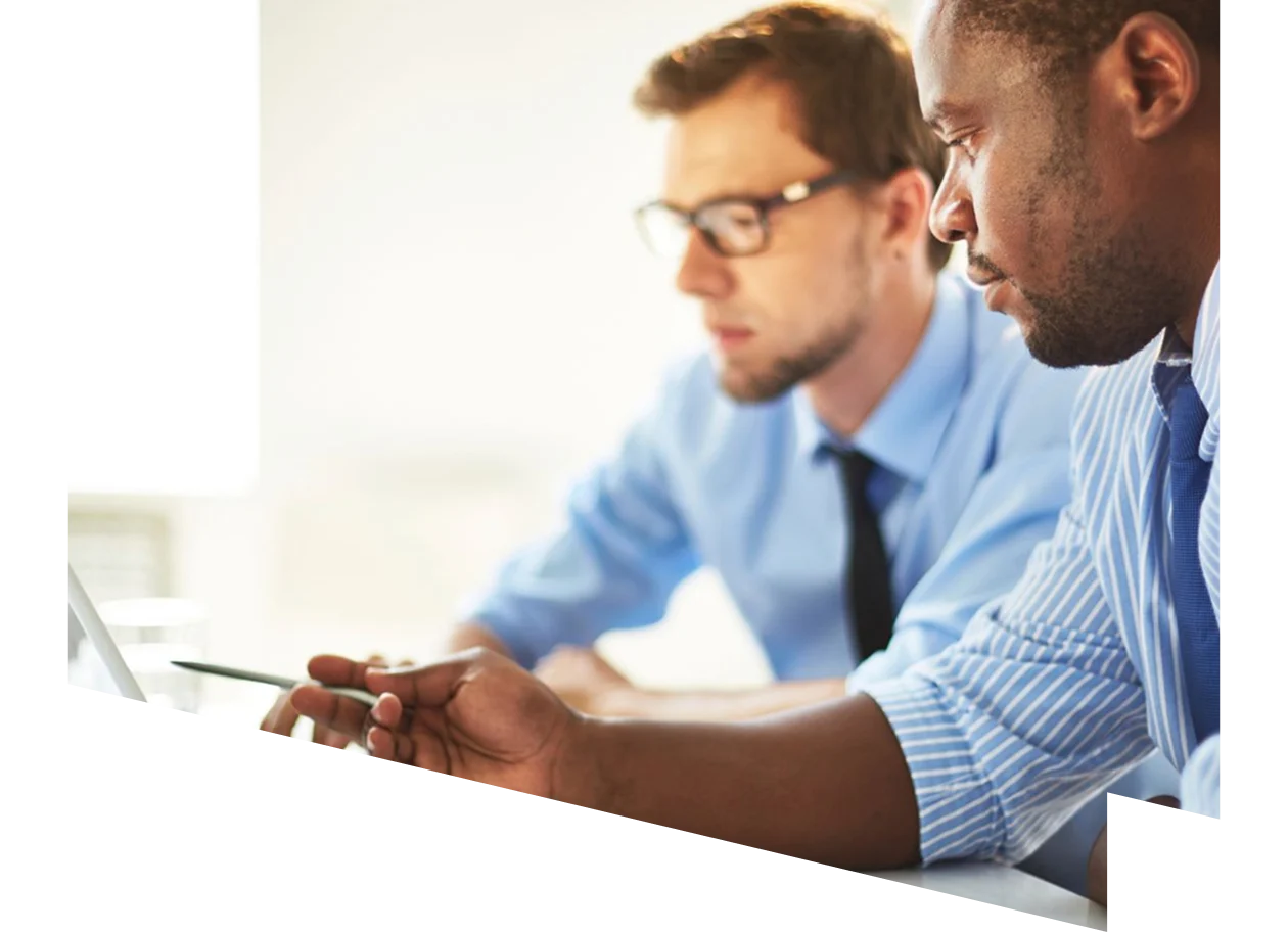 Two men looking at a tablet