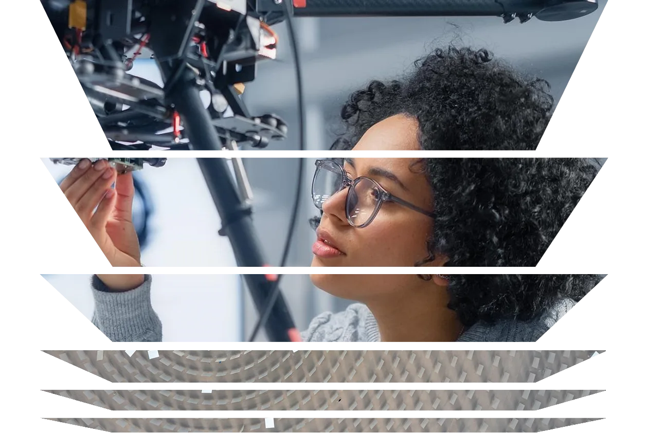 Female engineering working on a piece of machinery