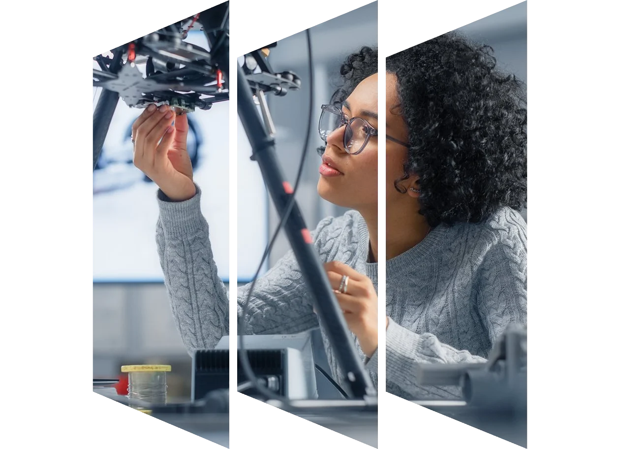 Female engineer developing software for a drone control in a research laboratory