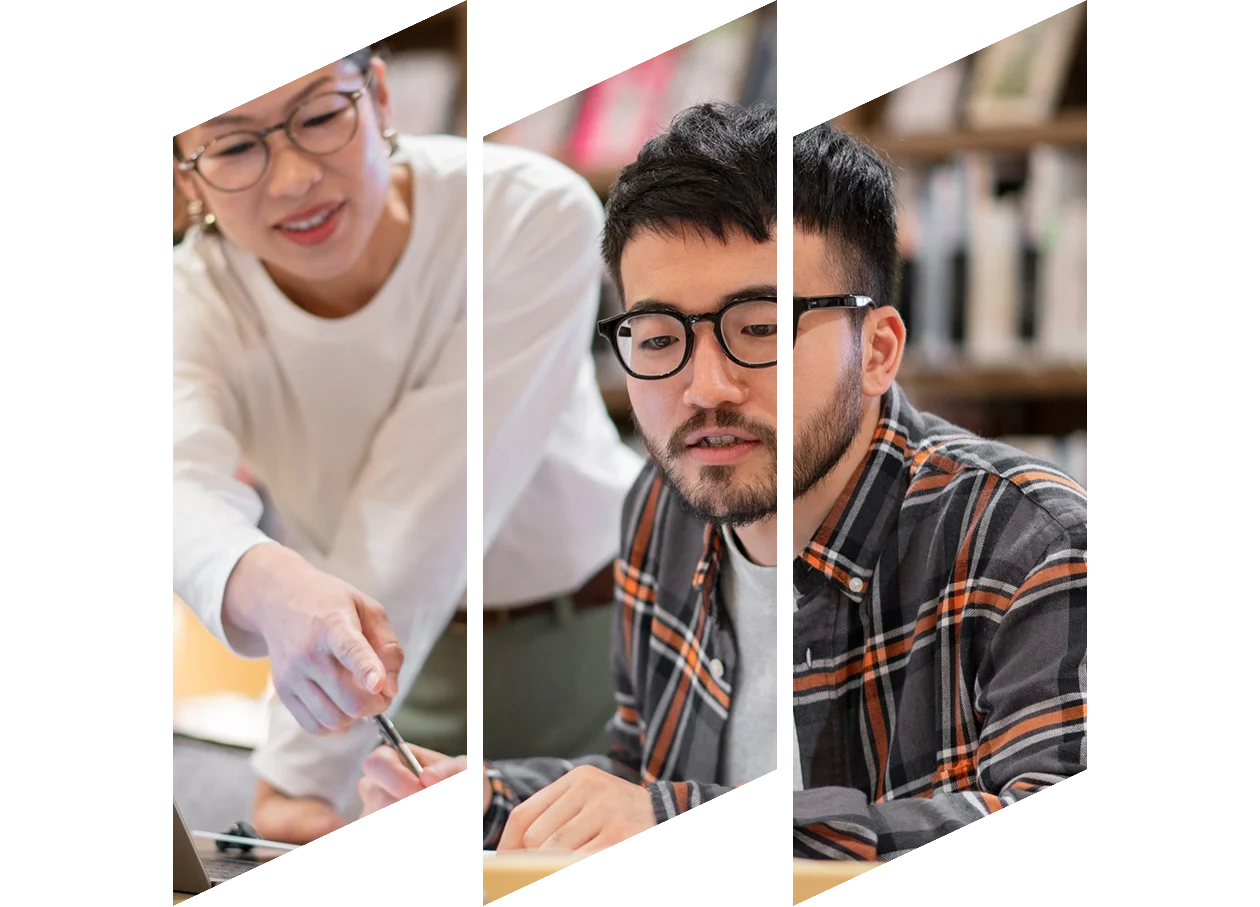 Librarian talking to a student in a library