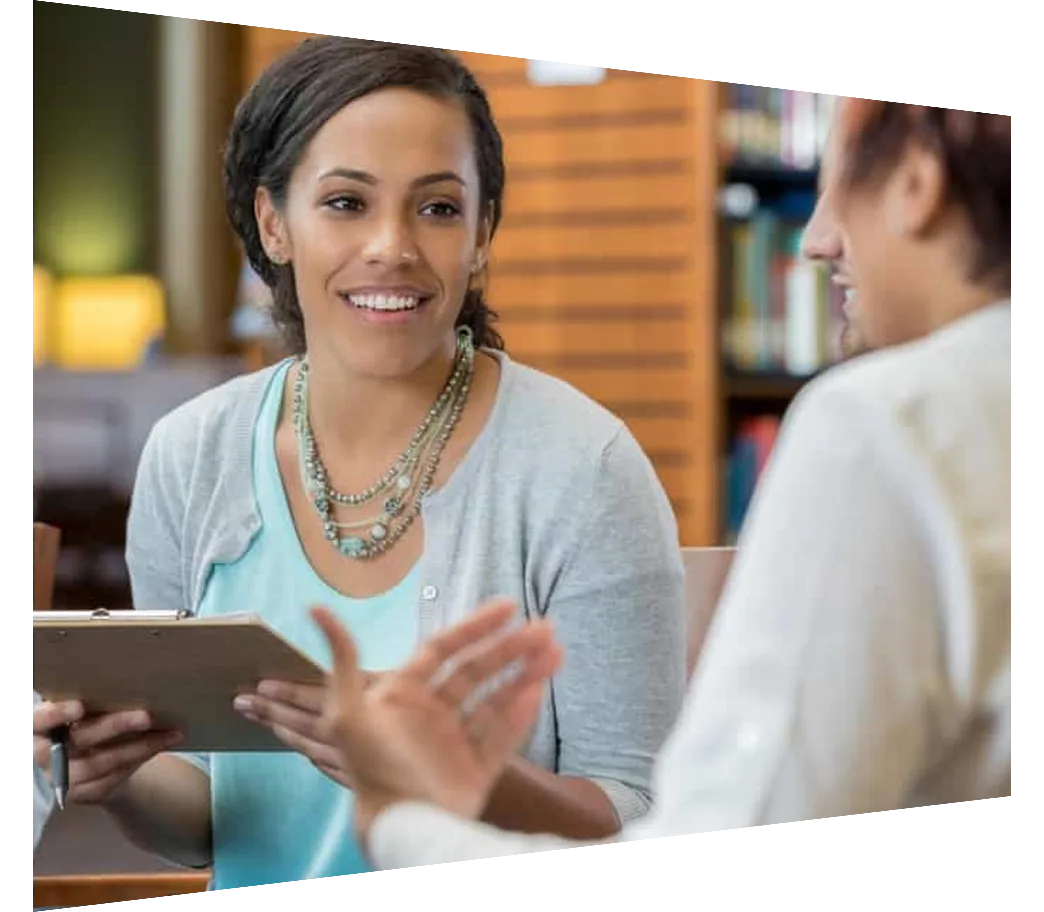 Young businesswoman having a conversation with a colleague