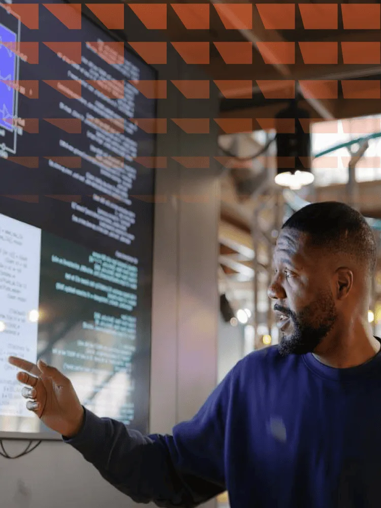 Man reviewing data on screen