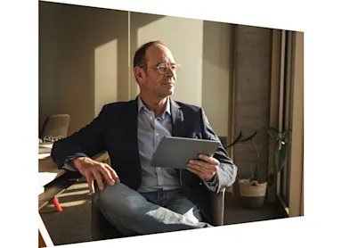 Man sitting with ipad