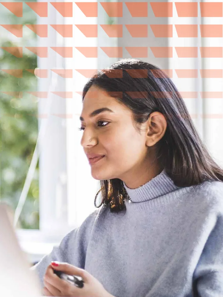 Students using laptops in classroom