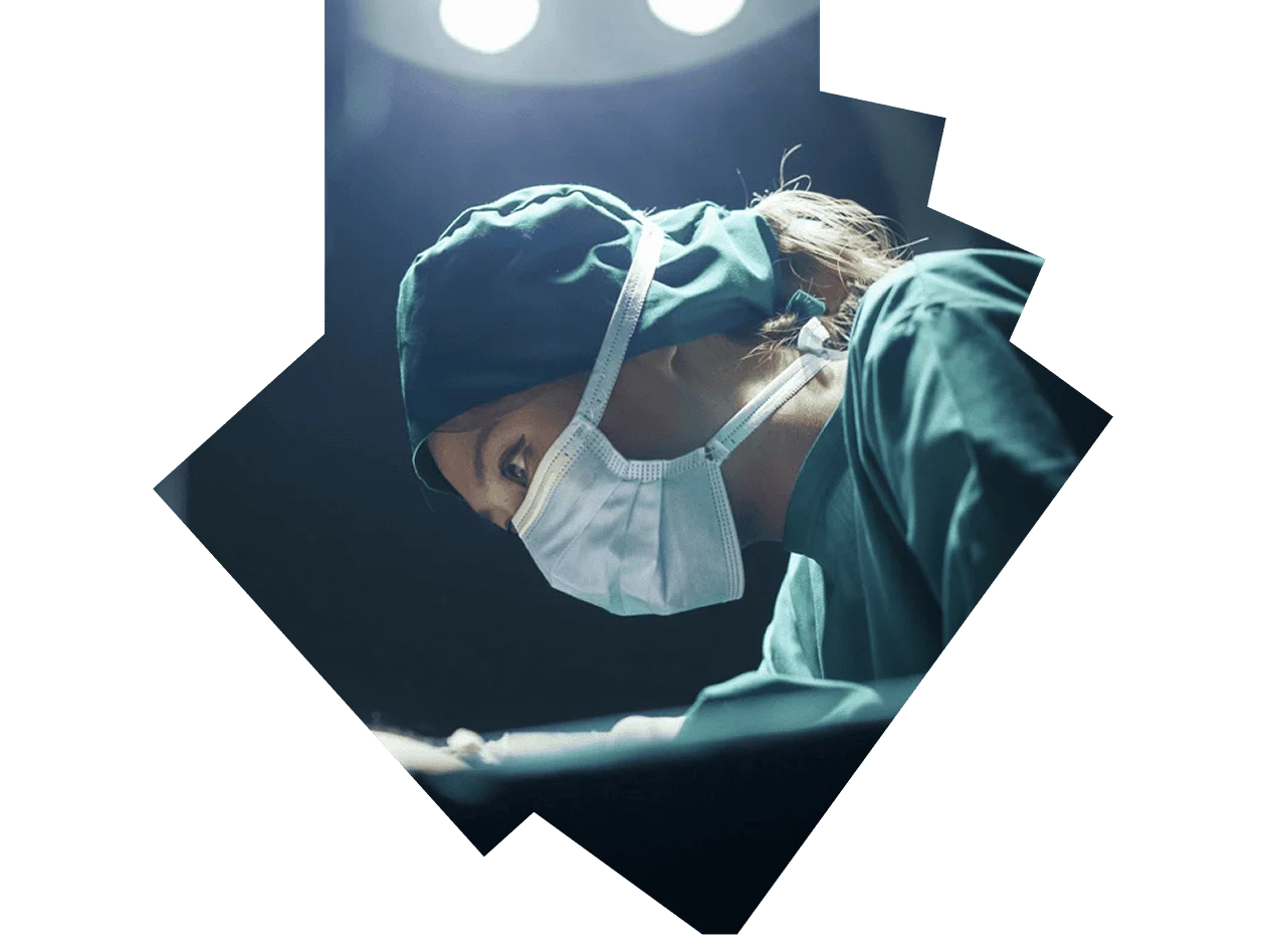 Female surgeon operating on a patient