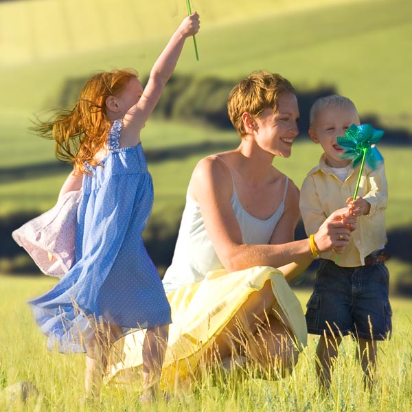 Woman is playing with children
