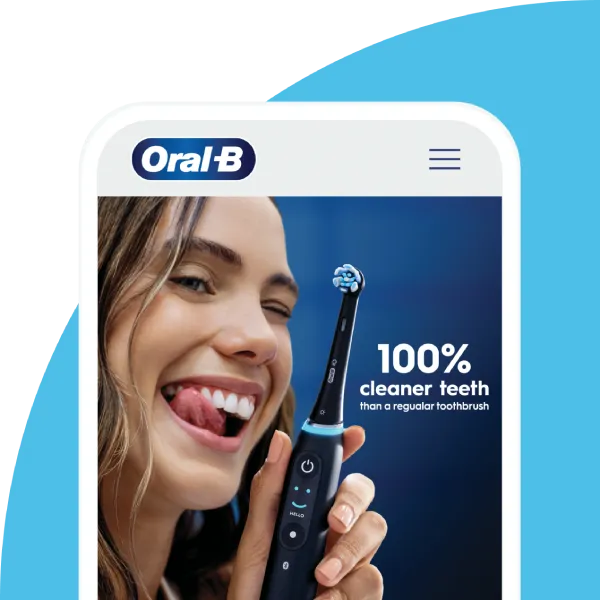 Smartphone screen with Oral-B advertising: model touches teeth with tongue while holding an Oral-B iO brush; claim of significantly better cleaning results.