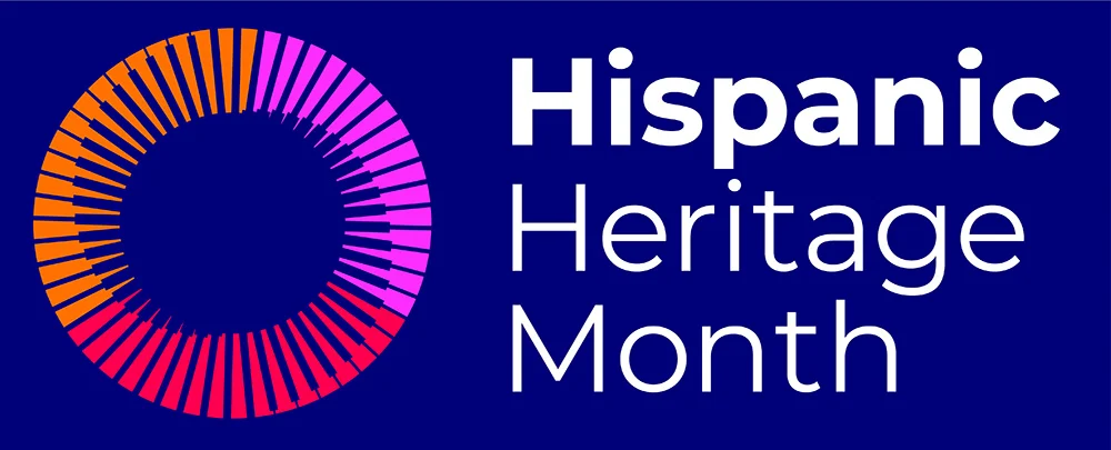 A pink, red and orange circle against a dark blue background. Blue text to the right of it says “Hispanic heritage month.”