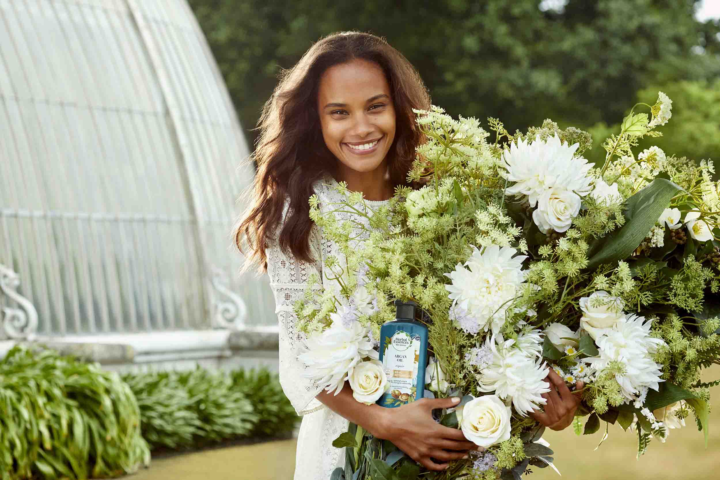 Girl holding flowers