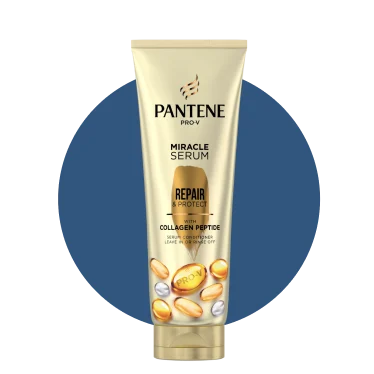 A light gold bottle of Pantene with gold capsule.