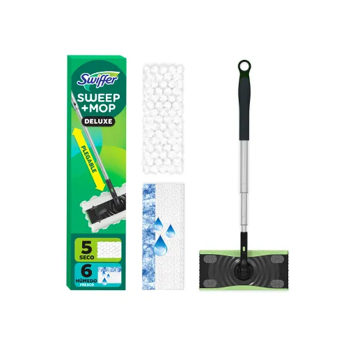 A tall rectangular box with a various text and image of a mop on the front. Two white pads and a black and green flathead mop sit next to the box.
